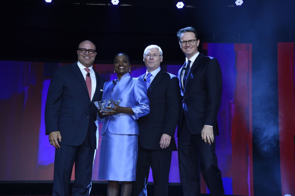 NCTA's Michael Powell, FCC Commissioner Clyburn, and the Kaitz dinner co-chairs.