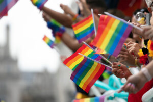 People Waving LGBTQ Flags