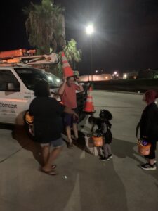 Comcast techs hold a Truck or Treat for families displaced by Hurricane Ida.